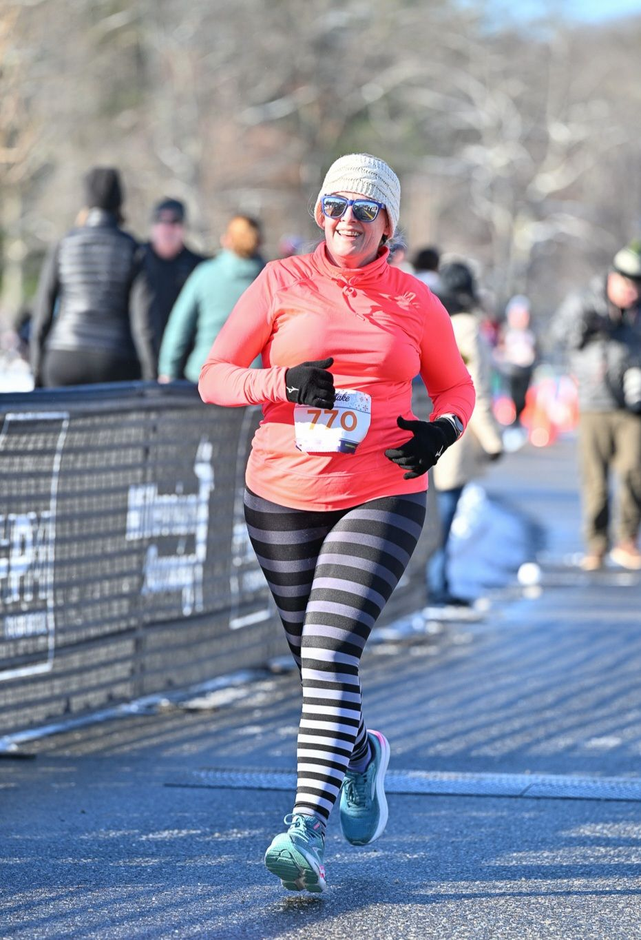 Runner smiling in cold weather race